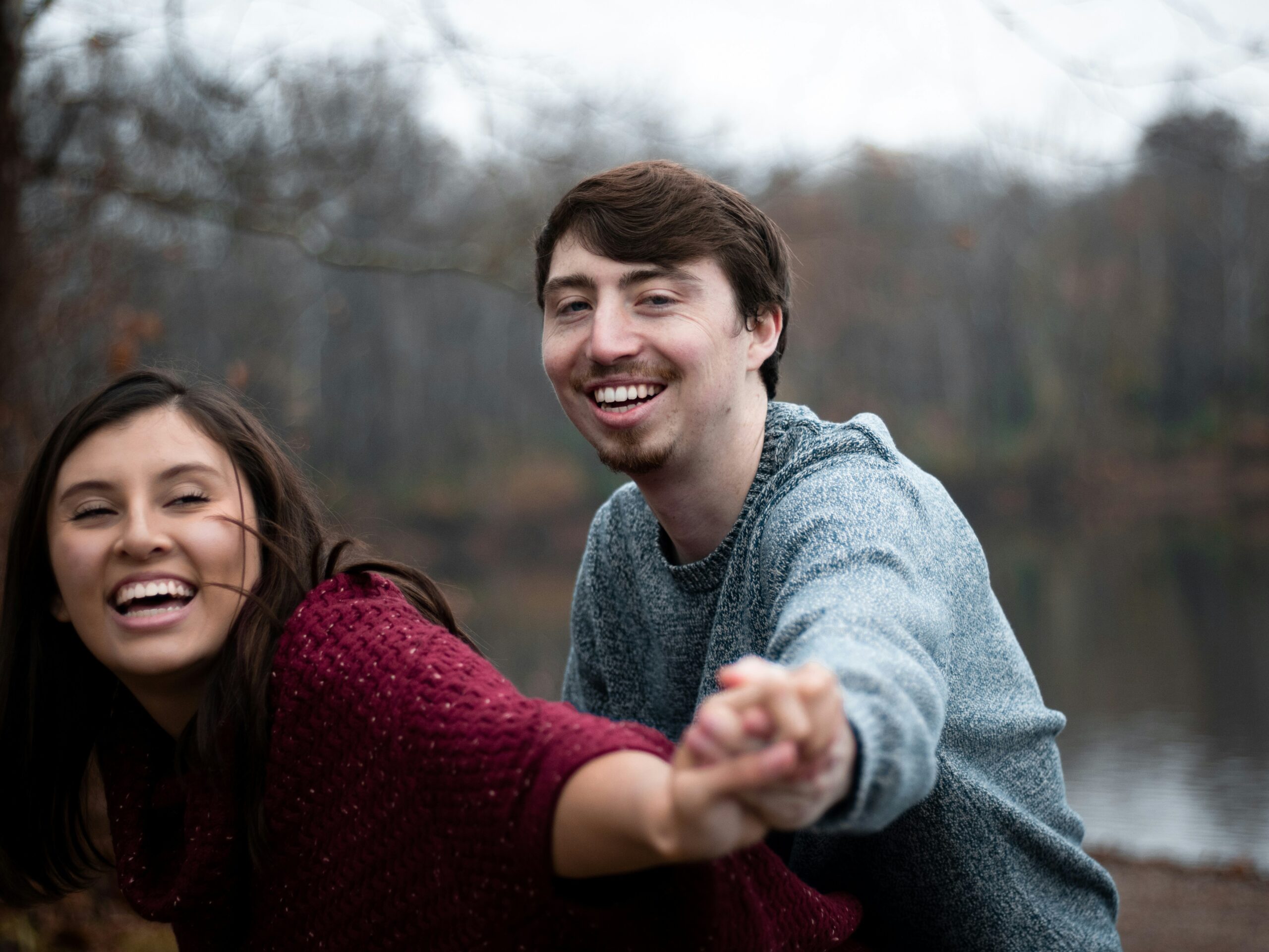 Photo of a happy couple celebrating savings from reduced burglary insurance premiums.