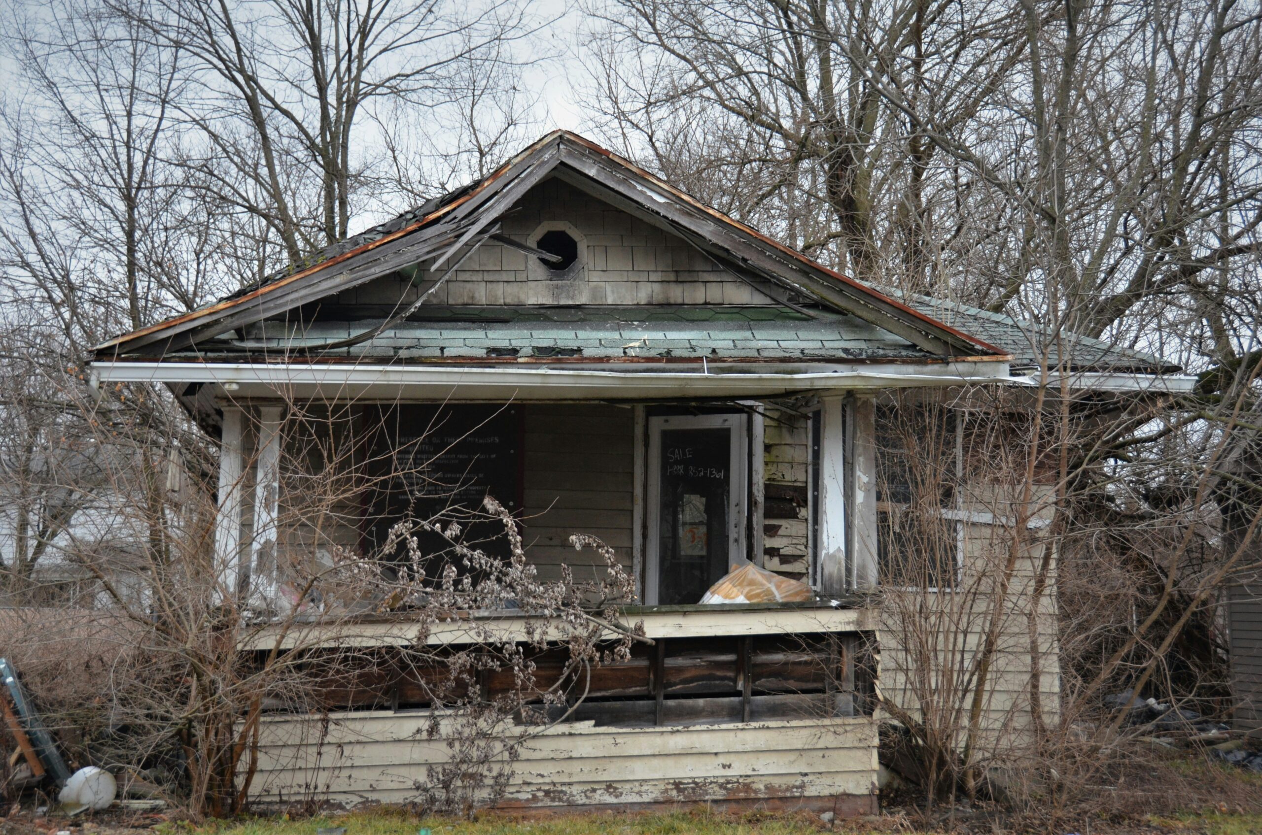 Comparison of two homeowners' claims outcomes due to varying insurance limits