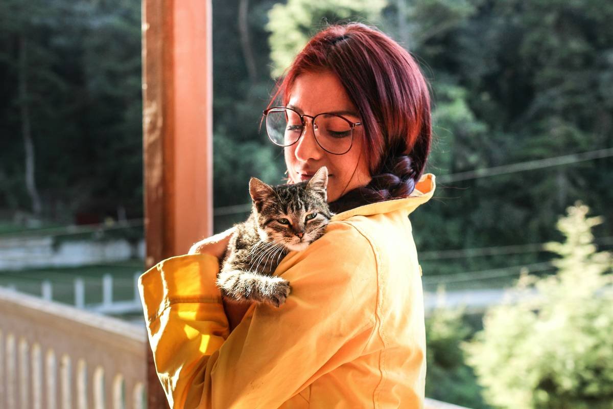Woman holding cat