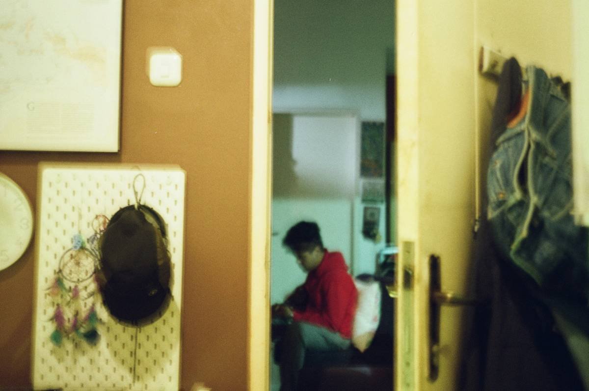 A man sitting in a chair in a room