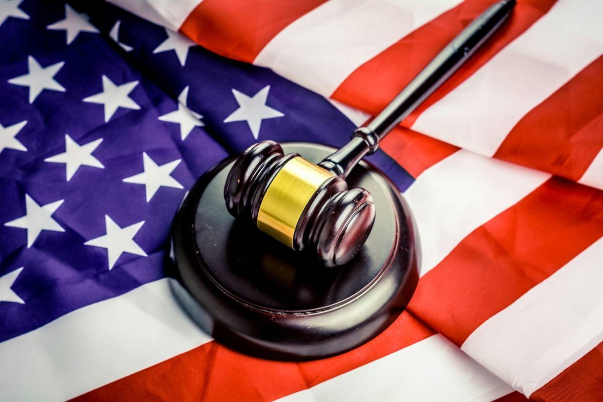Judge gavel over american flag. More of my photos and videos Adobe Stock:http://bit.ly/3RqlciK More of my photos and videos Shutterstock: https://www.shutterstock.com/g/ALEKSANDRBERDYUGIN My email: bermix999@gmail.com