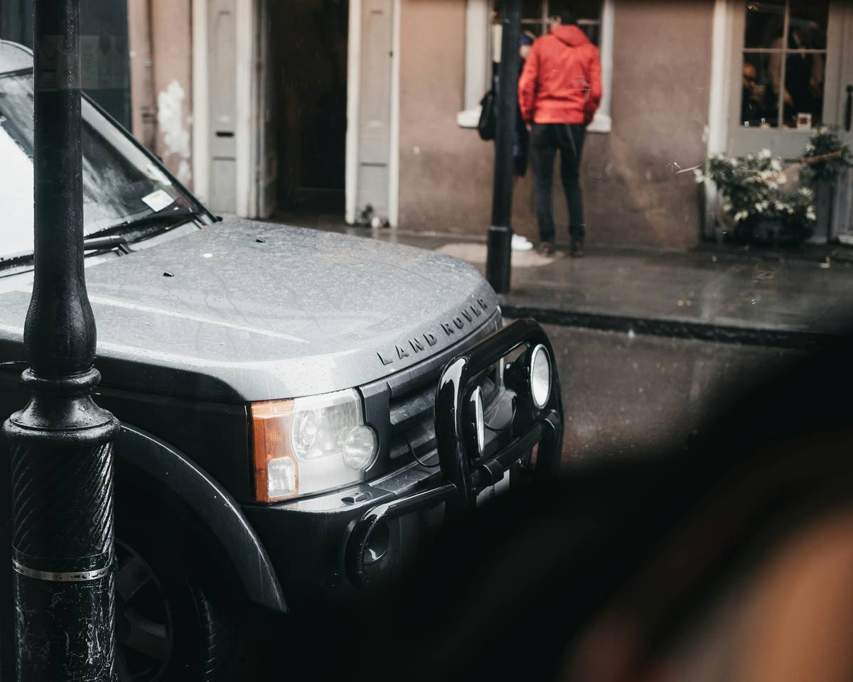 While in the beautiful New Orleans on this winter morning, stopped by a coffee shop that had a classic looking Land Rover in front of the shop. The rain and dark and gloomy day made this car stand out for some reason and loved its lines and color.